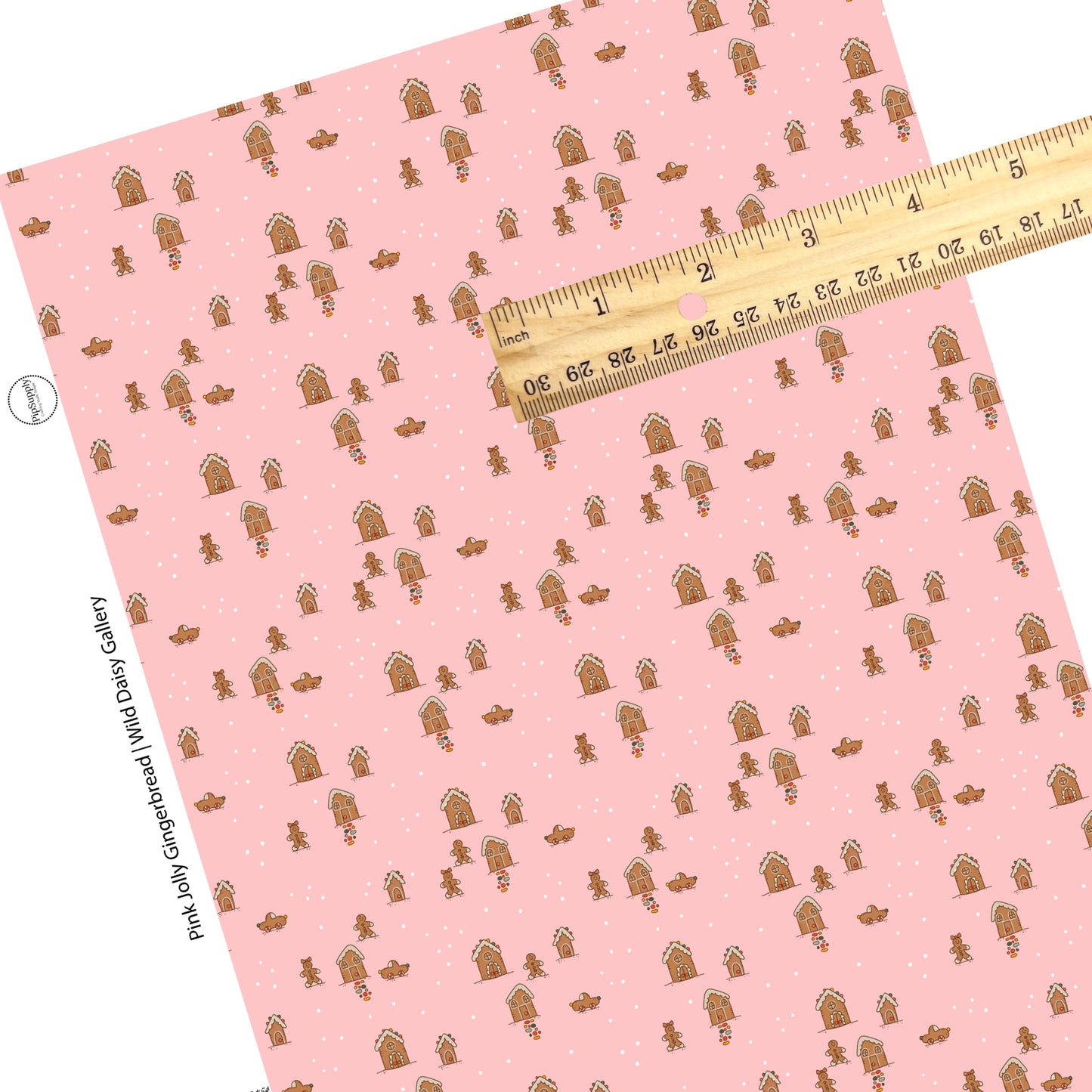 Tiny gingerbread houses, gingerbread man, and polka dots on pink faux leather sheets