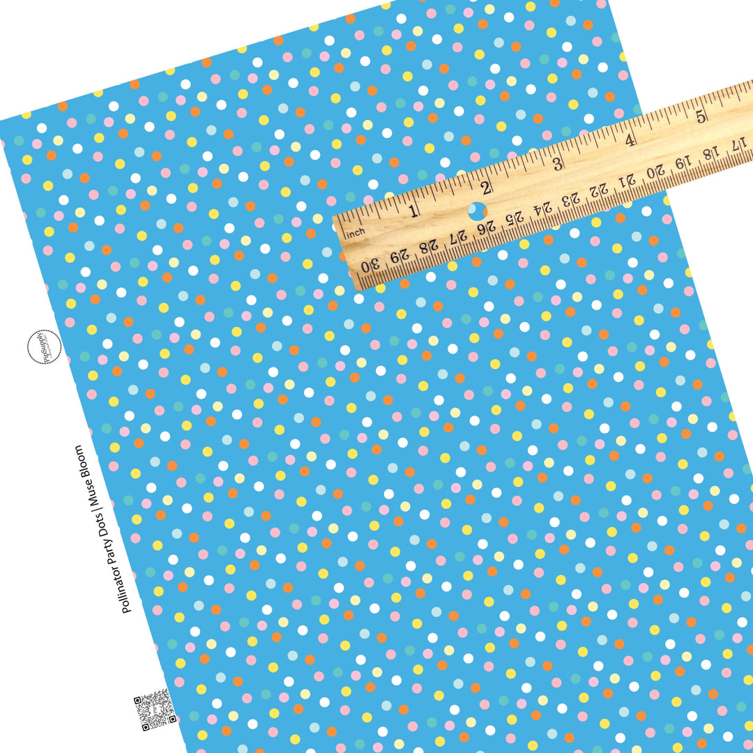 These spring dots pattern themed faux leather sheets contain the following design elements: bright multi colored dots on blue. Our CPSIA compliant faux leather sheets or rolls can be used for all types of crafting projects.