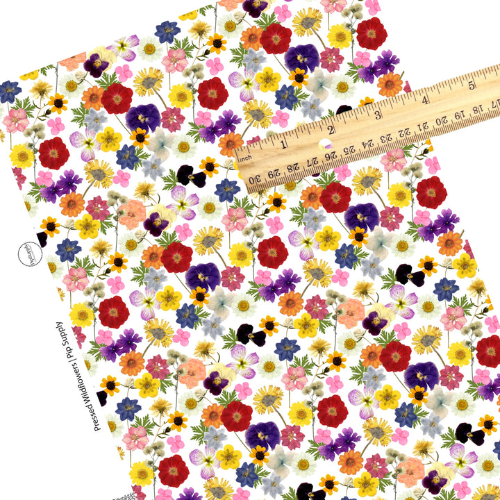 These floral themed faux leather sheets contain the following design elements: pressed wildflowers. Our CPSIA compliant faux leather sheets or rolls can be used for all types of crafting projects.