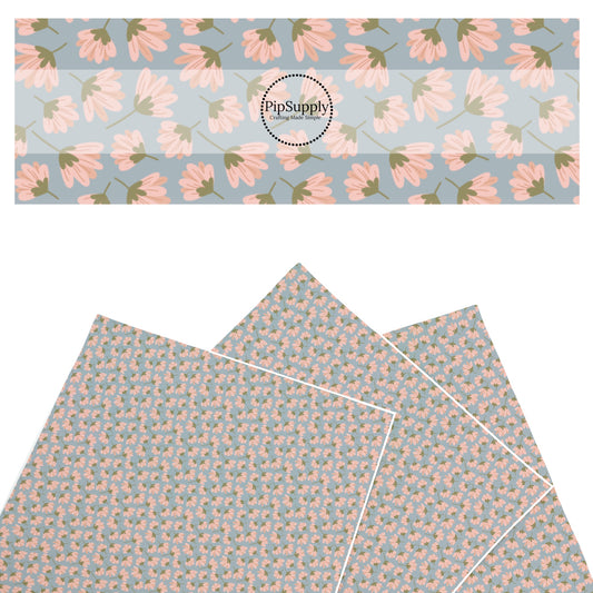 These summer faux leather sheets contain the following design elements: pink wildflowers on blue. Our CPSIA compliant faux leather sheets or rolls can be used for all types of crafting projects.