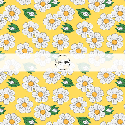This summer fabric by the yard features white flowers on yellow. This fun themed fabric can be used for all your sewing and crafting needs!