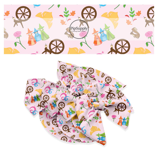 Spinning wheel, three fairies, flowers, and crowns on pink bow strips