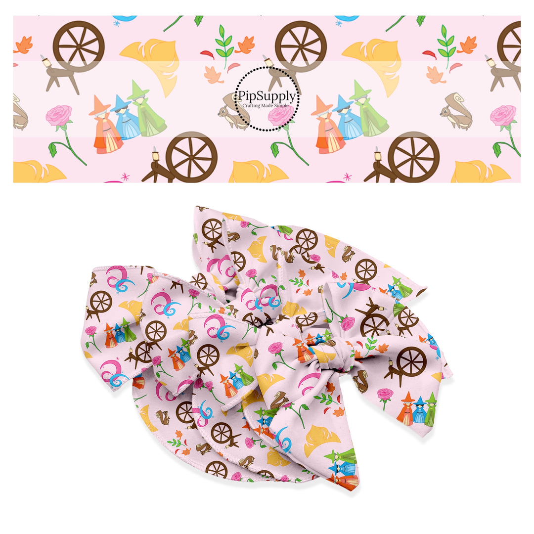 Spinning wheel, three fairies, flowers, and crowns on pink bow strips