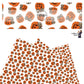 Leopard hair bows on orange pumpkins on white faux leather sheets