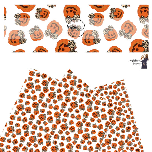Leopard hair bows on orange pumpkins on white faux leather sheets