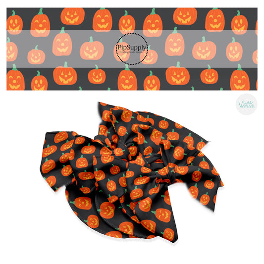 Orange pumpkins with faces on black hair bow strips