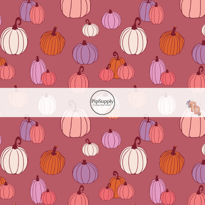 Multi pumpkins on mauve hair bow strips