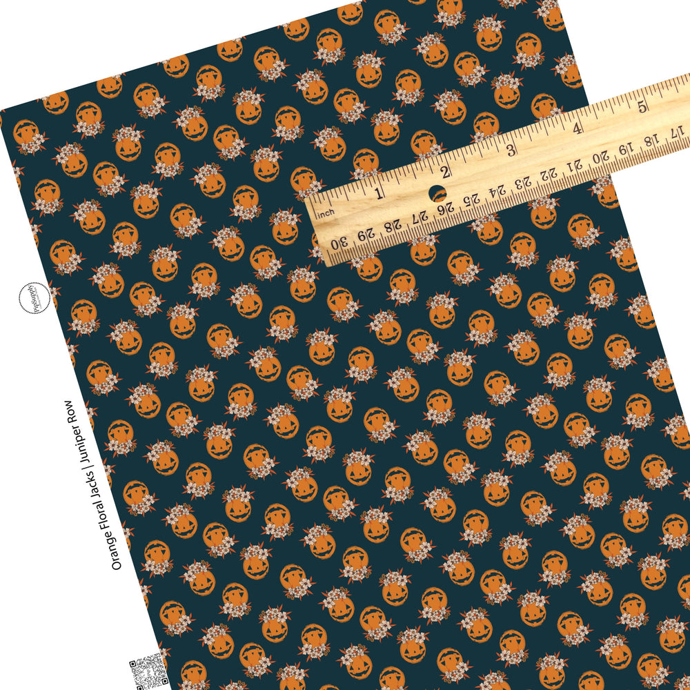 Floral orange pumpkins on black faux leather sheets