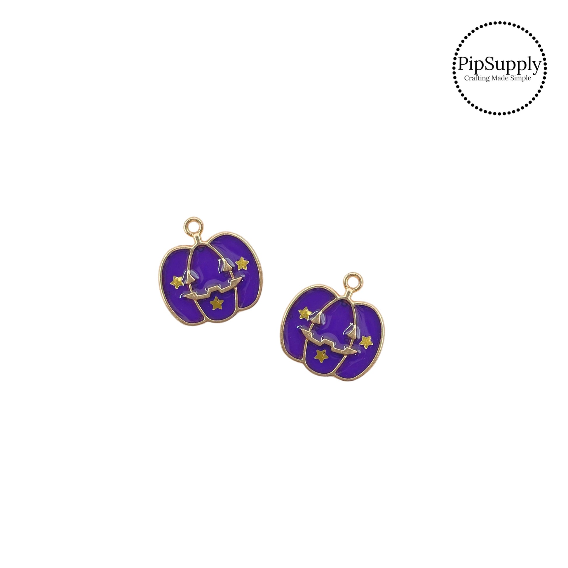 Gold stars and spooky face on purple pumpkin charm embellishment