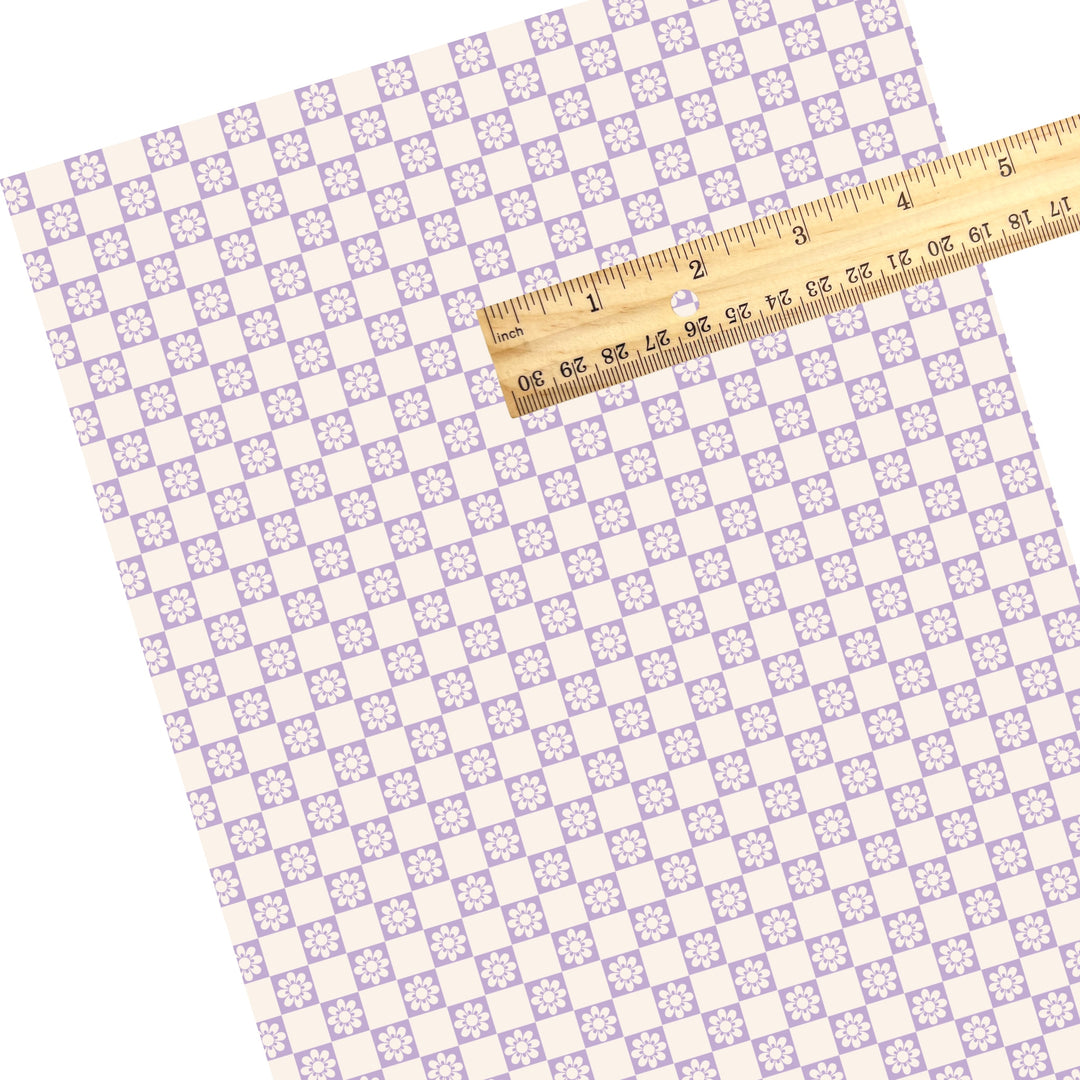 These spring themed faux leather sheets contain the following design elements: daisy flowers on purple and cream checkers. Our CPSIA compliant faux leather sheets or rolls can be used for all types of crafting projects.