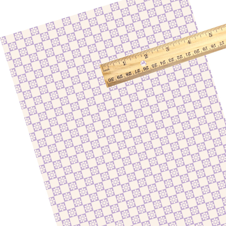 These spring themed faux leather sheets contain the following design elements: daisy flowers on purple and cream checkers. Our CPSIA compliant faux leather sheets or rolls can be used for all types of crafting projects.