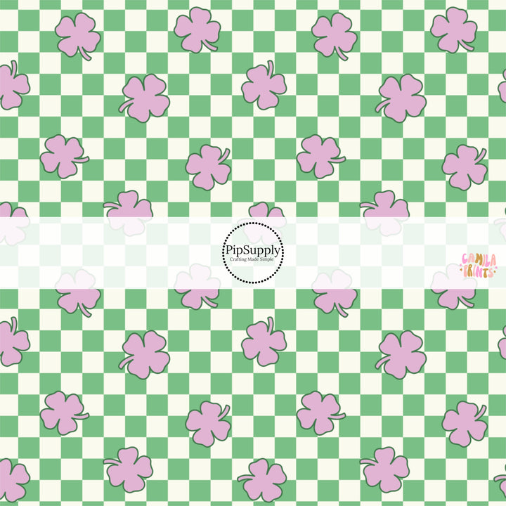 This holiday fabric by the yard features purple cloves on green and cream checkers. This festive pattern fabric can be used for all your sewing and crafting needs!