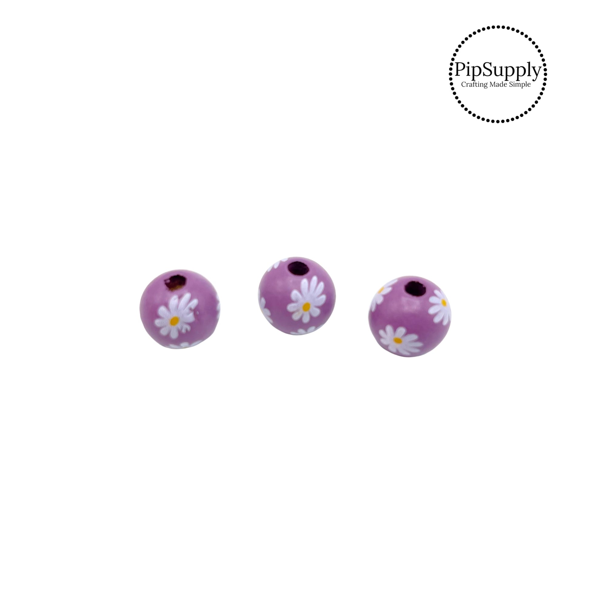 White flowers on purple flower bead embellishment