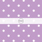 This celebration fabric by the yard features white dots on light purple. This fun themed fabric can be used for all your sewing and crafting needs!