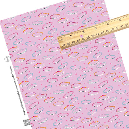 These Valentine's Day pattern themed faux leather sheets contain the following design elements: friendship bracelets. Our CPSIA compliant faux leather sheets or rolls can be used for all types of crafting projects.