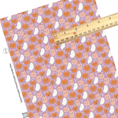 Orange pumpkins with white ghost and stars on purple faux leather sheets