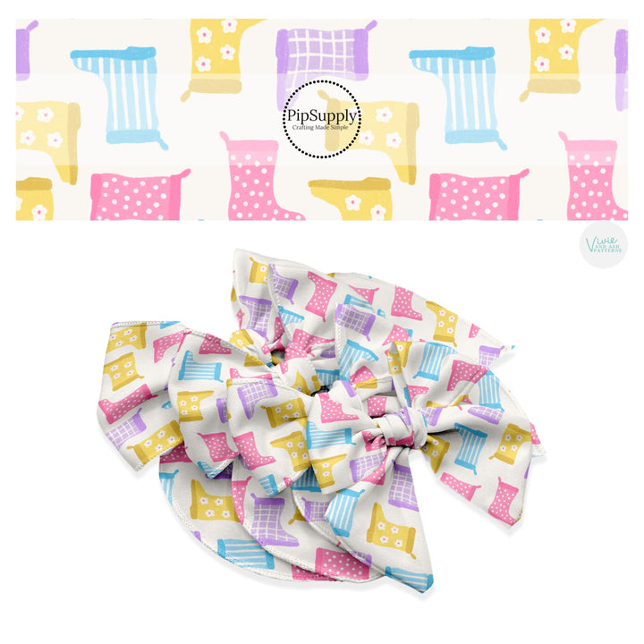 These spring bows themed no sew bow strips can be easily tied and attached to a clip for a finished hair bow. These patterned bow strips are great for personal use or to sell. These bow strips features pastel pink, purple, yellow, and blue rain boots on cream. 