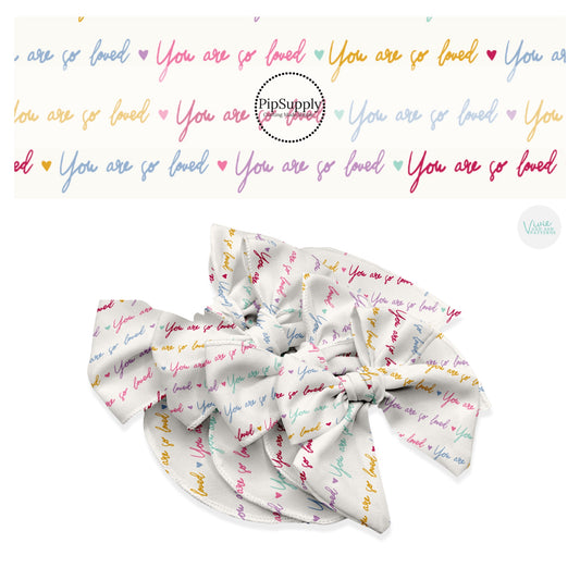 Multi cursive you are so loved sayings on cream hair bow strips