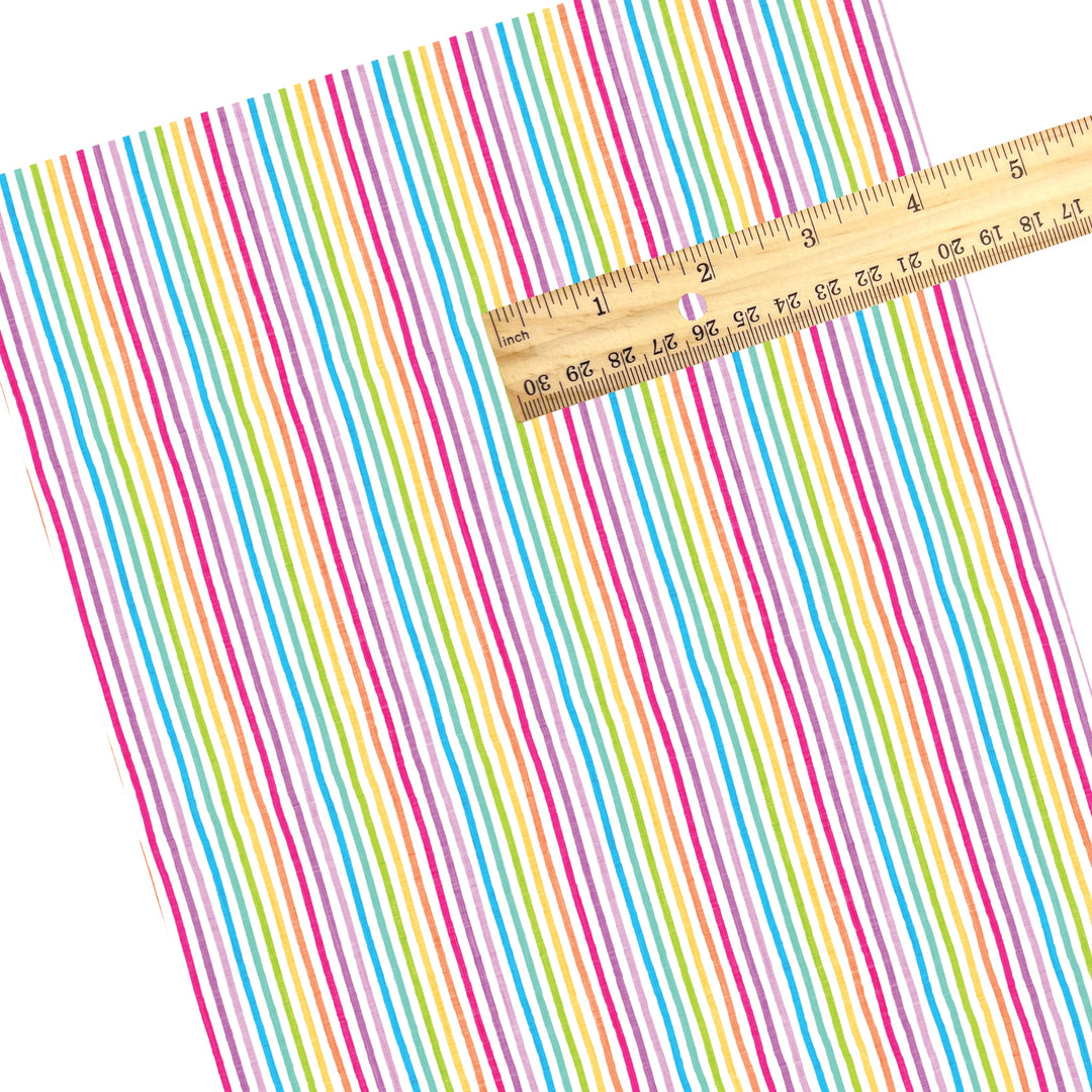 These summer faux leather sheets contain the following design elements: bright rainbow stripes. Our CPSIA compliant faux leather sheets or rolls can be used for all types of crafting projects.