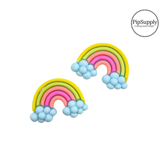 Blue clouds on yellow, green, and multi pink rainbow flat back resin embellishment