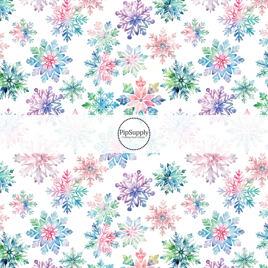 This winter snowflake fabric by the yard features colorful snowflakes on cream. This fun winter fabric can be used for all your sewing and crafting needs!