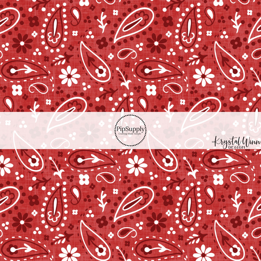 These patriotic and western red fabric by the yard features white, red and dark red bandana pattern.