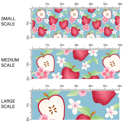 This scale chart of small scale, medium scale, and large scale of these fall apples themed blue fabric by the yard features red apples and apple slices with small flowers on blue. This fun fall themed fabric can be used for all your sewing and crafting needs! 