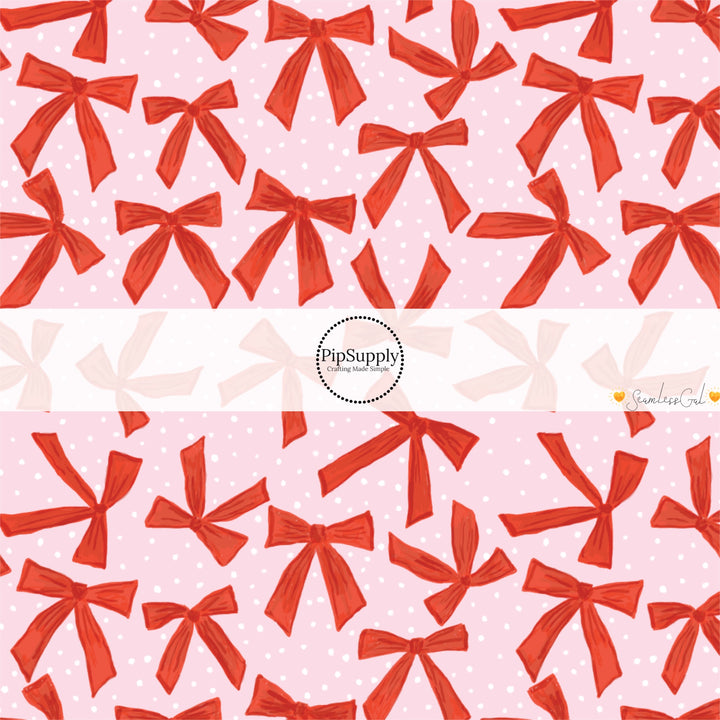 These winter bow themed pattern fabric by the yard features the following design elements: red bows on pink. This fun themed fabric can be used for all your sewing and crafting needs!