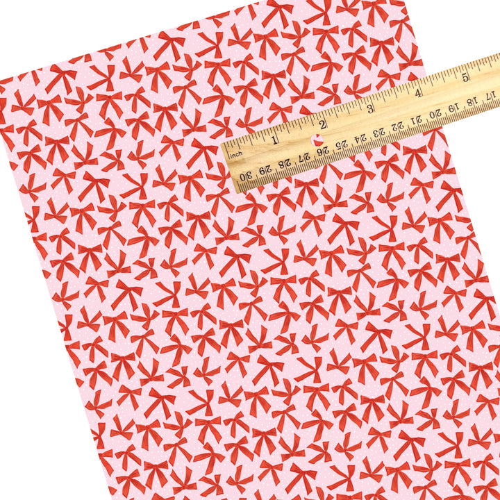 These winter bow themed pattern faux leather sheets contain the following design elements: red bows on pink. Our CPSIA compliant faux leather sheets or rolls can be used for all types of crafting projects.