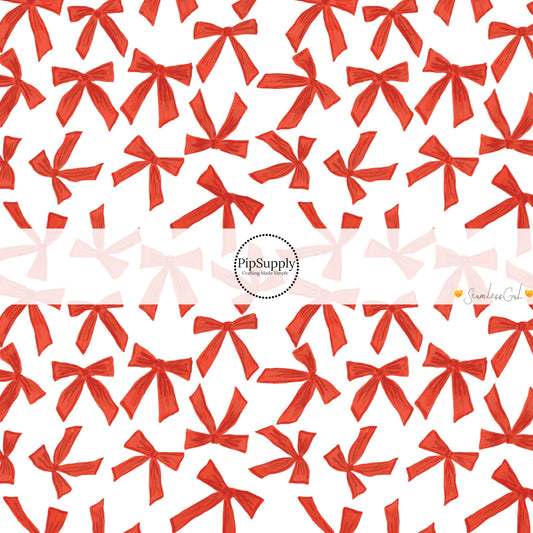 These winter bow themed pattern fabric by the yard features the following design elements: red bows on cream. This fun themed fabric can be used for all your sewing and crafting needs!