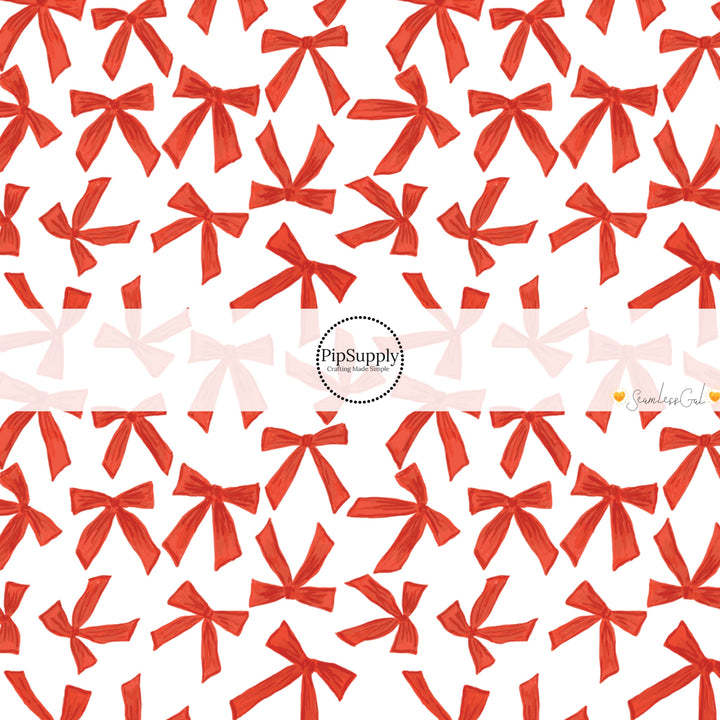 These winter bow themed pattern fabric by the yard features the following design elements: red bows on cream. This fun themed fabric can be used for all your sewing and crafting needs!