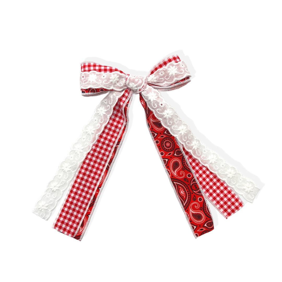 These patriotic lace, gingham, and paisley long tail pre-cut tied bows are ready to package and resell to your customers no sewing or measuring necessary! These hair bows come with a clip already attached.