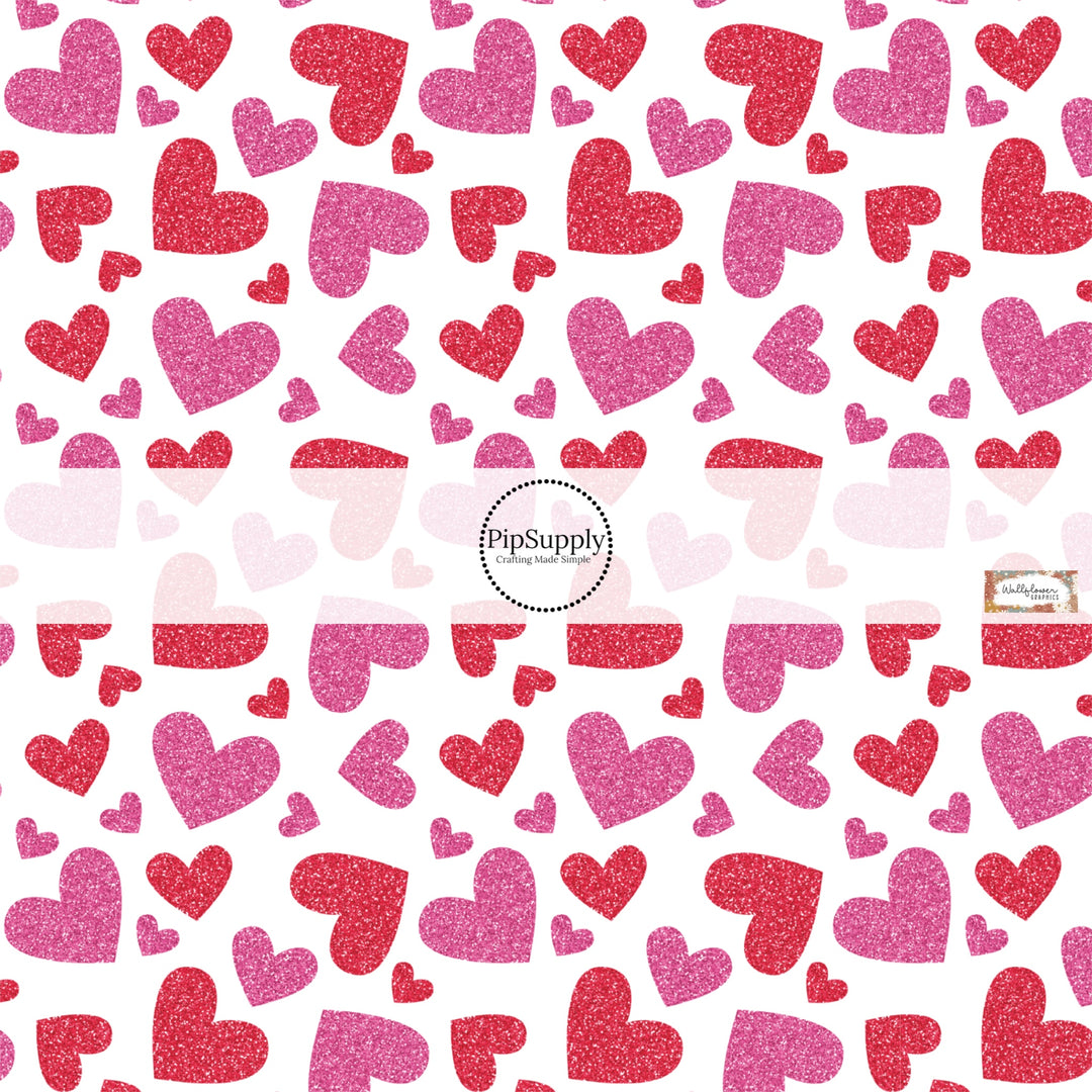 This holiday fabric by the yard features red and pink hearts. This festive pattern fabric can be used for all your sewing and crafting needs!