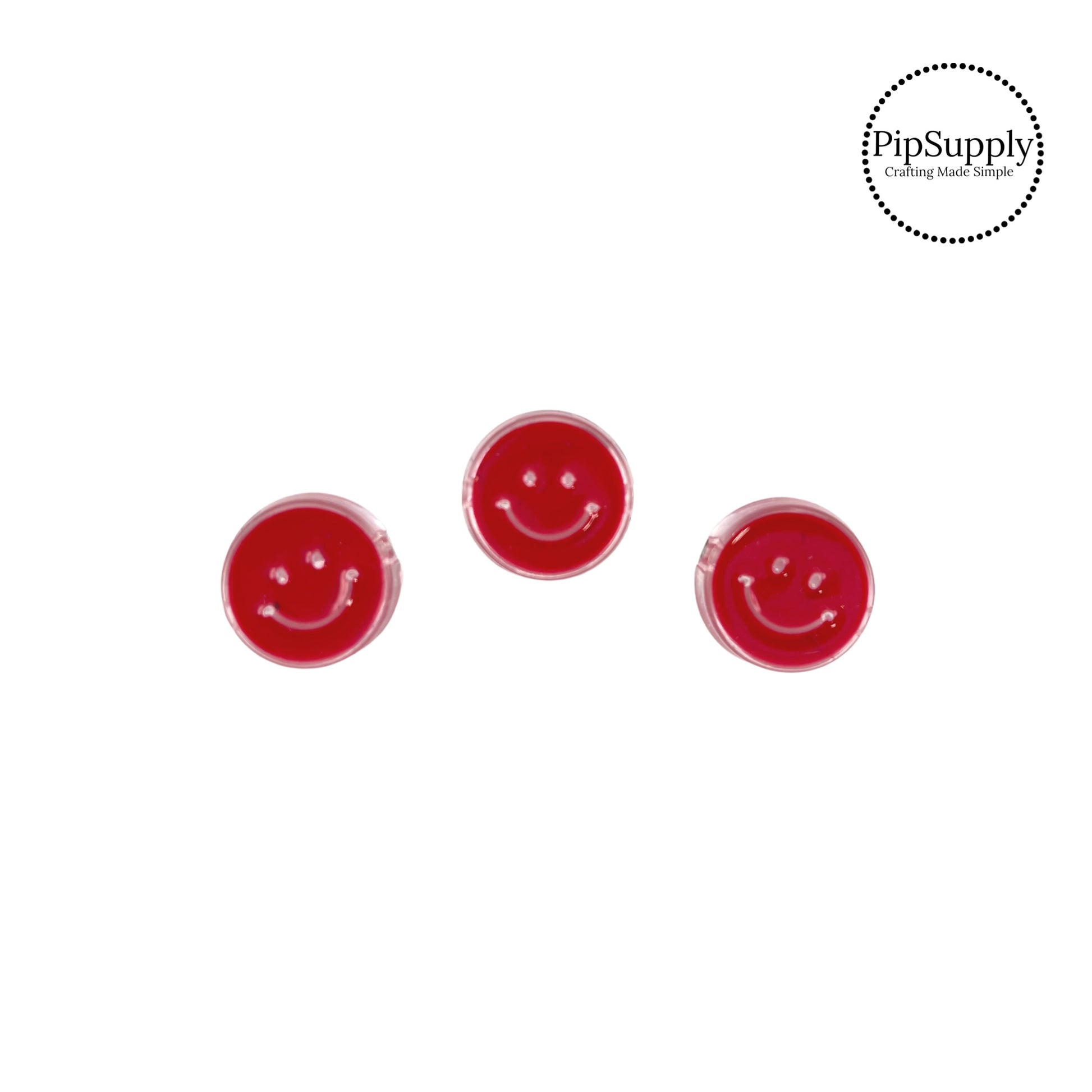 Red smiley face on clear bead embellishment