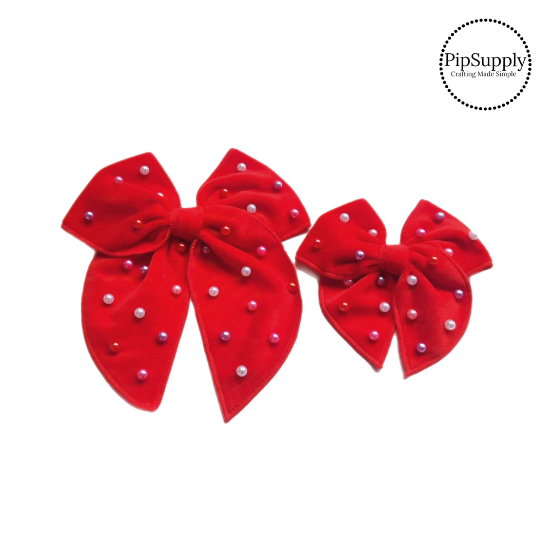 These Valentine red velvet pearl tied bows are ready to package and resell to your customers no sewing or measuring necessary! These hair bows come with a alligator clip already attached. Along with white and pink pearls.