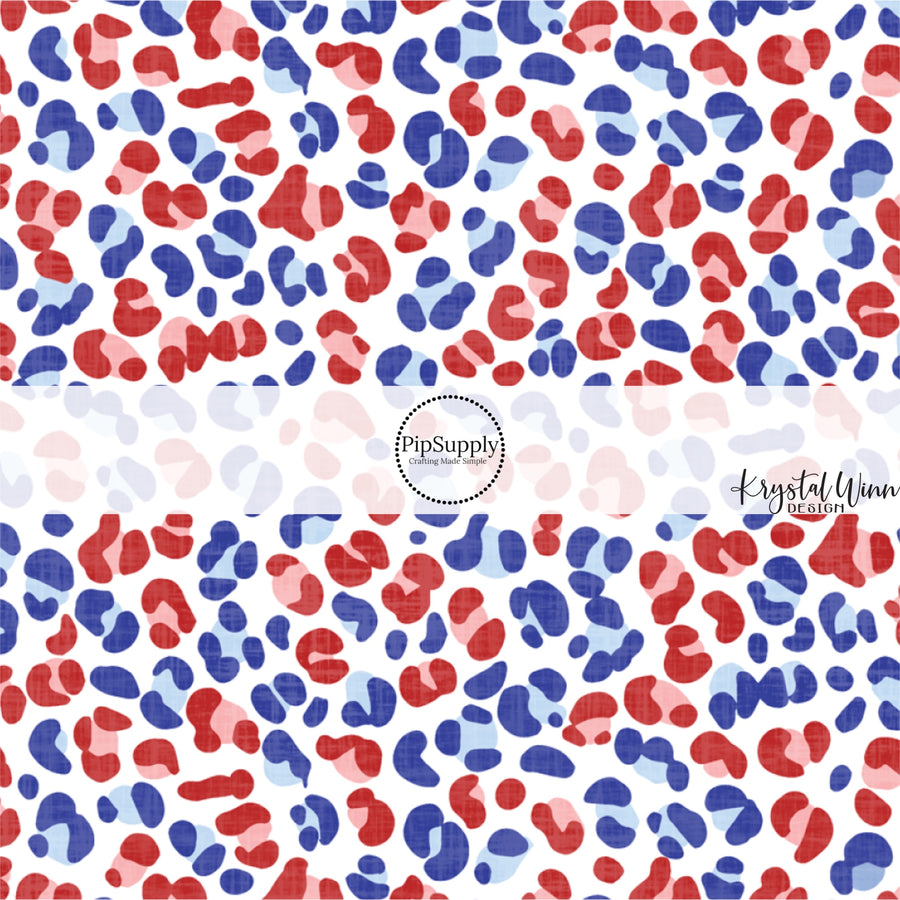 These patriotic red and blue cheetah spots on white fabric by the yard features small red and blue cheetah print pattern.