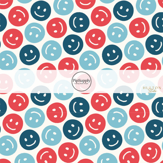 This 4th of July fabric by the yard features patriotic red and blue smiley on cream. This fun patriotic themed fabric can be used for all your sewing and crafting needs!