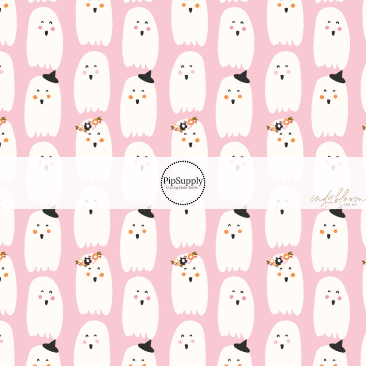 These Halloween themed pattern fabric by the yard features the following design elements: ghost on light pink. This fun spooky themed fabric can be used for all your sewing and crafting needs!