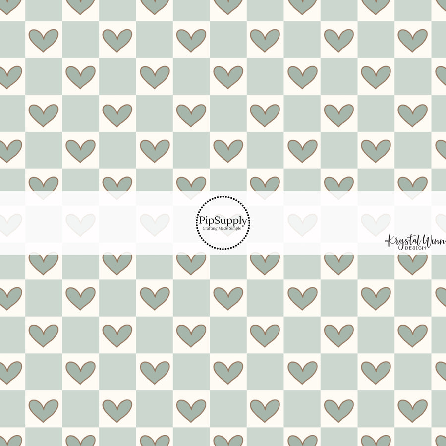 This Valentine's Day themed fabric by the yard features light blue checker pattern with hearts. This fun pattern fabric can be used for all your sewing and crafting needs!