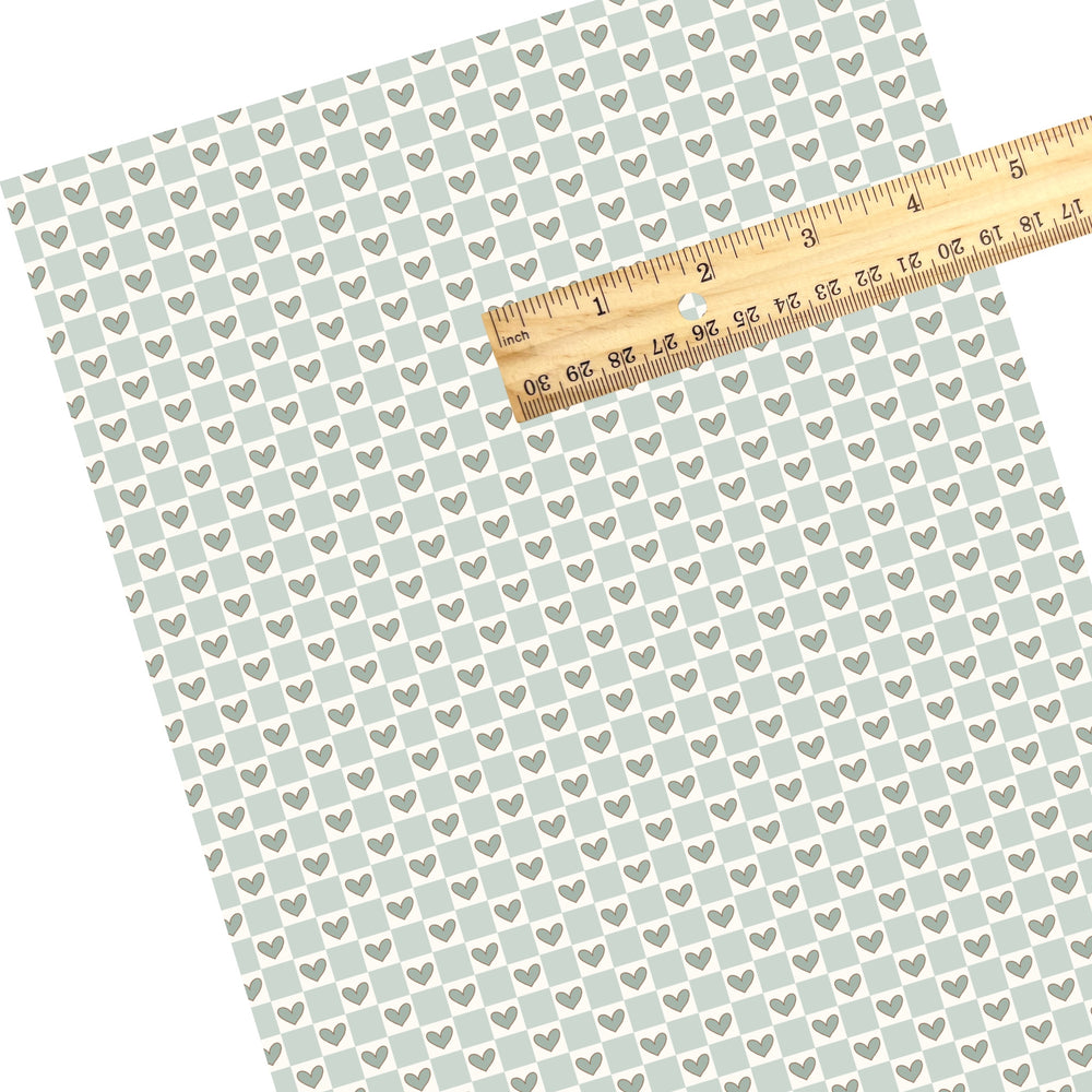 These Valentine's Day themed faux leather sheets contain the following design elements: light blue checker pattern with hearts. Our CPSIA compliant faux leather sheets or rolls can be used for all types of crafting projects.