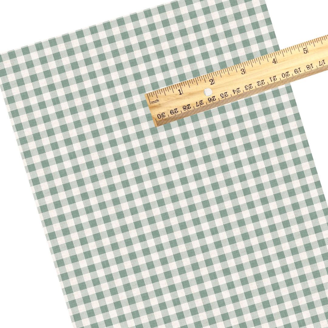 These winter plaid themed pattern faux leather sheets contain the following design elements: sage gingham pattern. Our CPSIA compliant faux leather sheets or rolls can be used for all types of crafting projects.