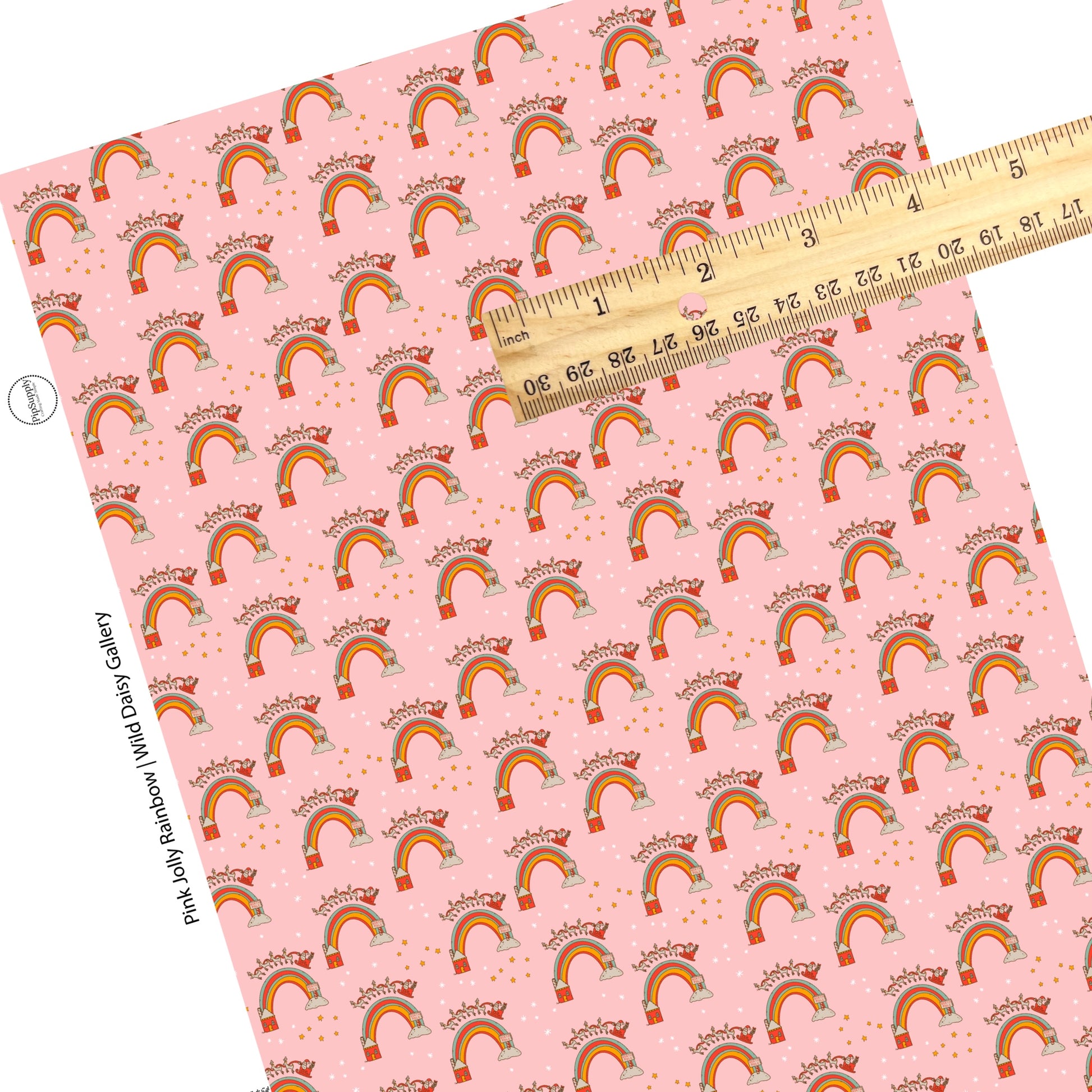 rainbows with santa and reindeer flying over them on pink faux leather sheet