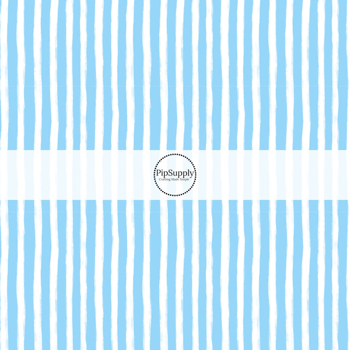 These Santa themed pattern fabric by the yard features the following design elements: blue and white Christmas stripes. This fun themed fabric can be used for all your sewing and crafting needs!