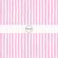 These Santa themed pattern fabric by the yard features the following design elements: pink and white Christmas stripes. This fun themed fabric can be used for all your sewing and crafting needs!