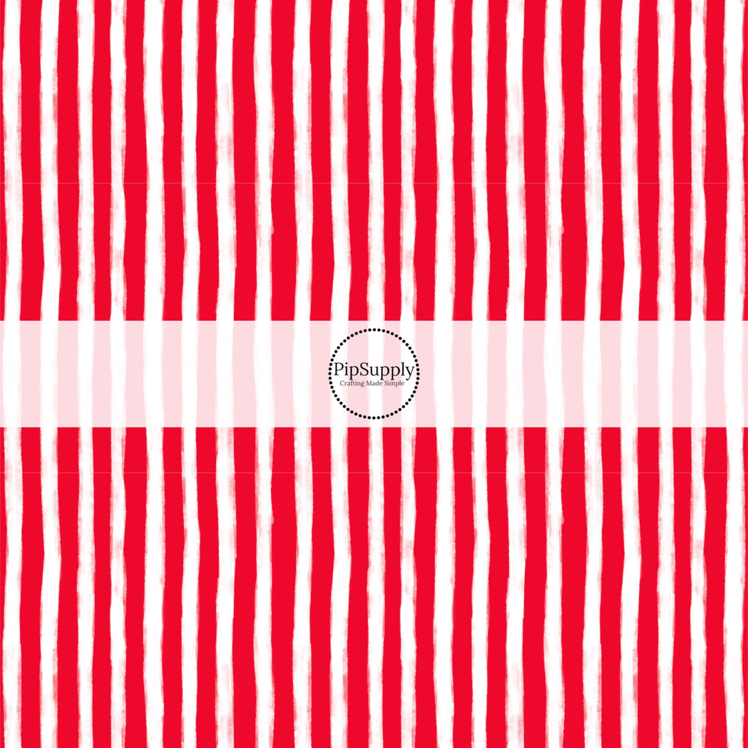 These Santa themed pattern fabric by the yard features the following design elements: red and white Christmas stripes. This fun themed fabric can be used for all your sewing and crafting needs!