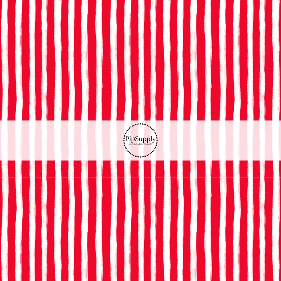 These Santa themed pattern fabric by the yard features the following design elements: red and white Christmas stripes. This fun themed fabric can be used for all your sewing and crafting needs!