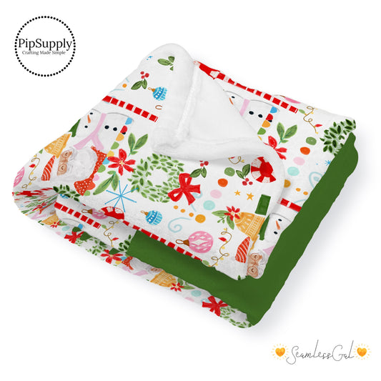 This winter designer pattern is printed onto the front side of our soft touch minky blankets. The backside will not be printed and left the natural cream/white color of the blanket. This print pattern features Santa, Christmas wreaths, and decorations on cream.