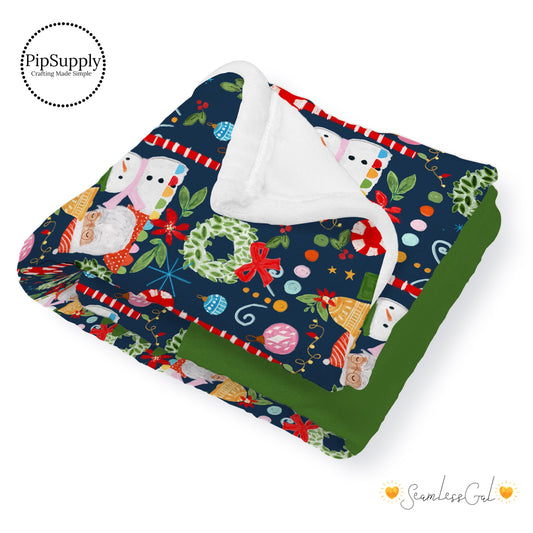 This winter designer pattern is printed onto the front side of our soft touch minky blankets. The backside will not be printed and left the natural cream/white color of the blanket. This print pattern features Santa, Christmas wreaths, and decorations on navy.