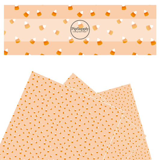 Orange candy corns on orange faux leather sheets