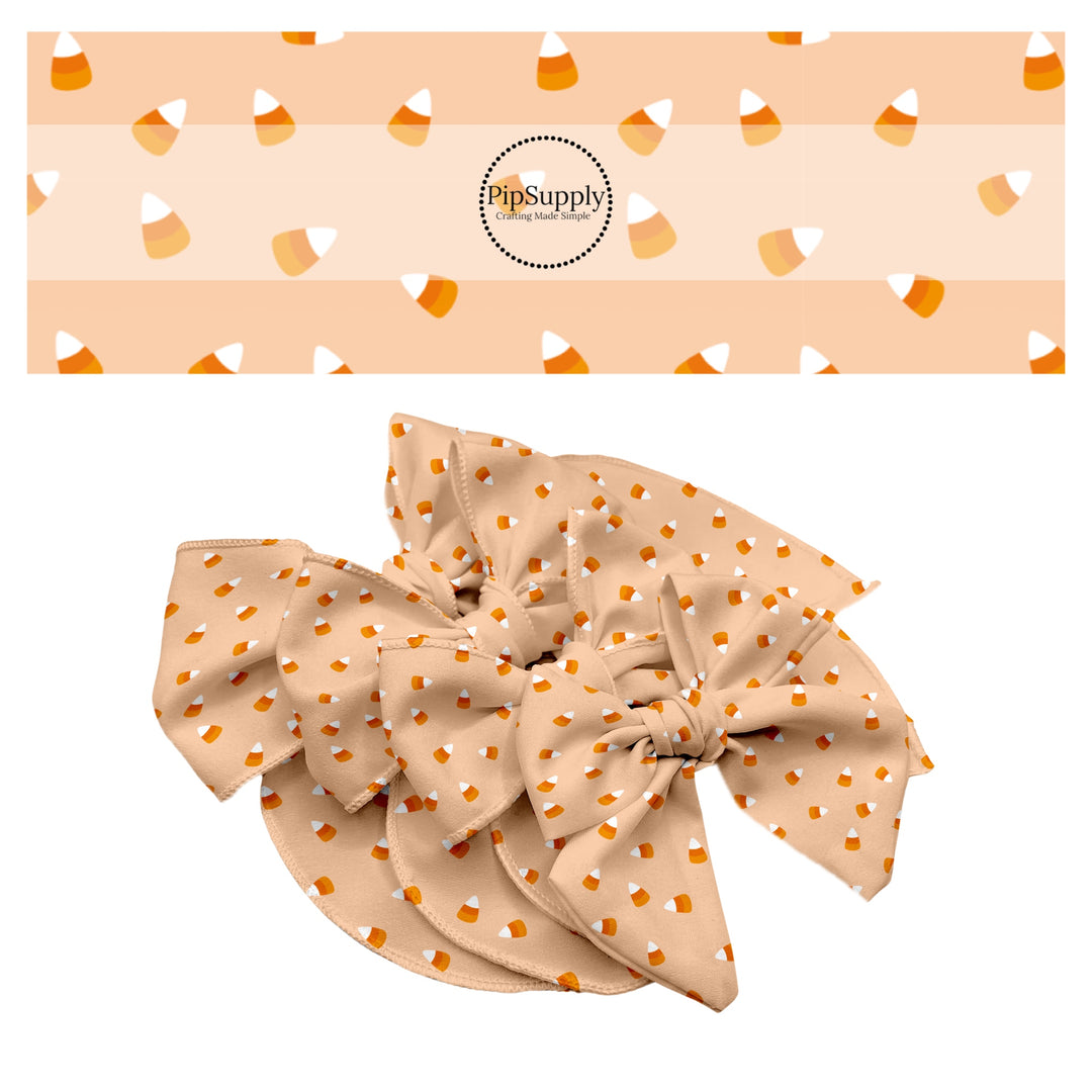 Orange and white candy on orange hair bow strips